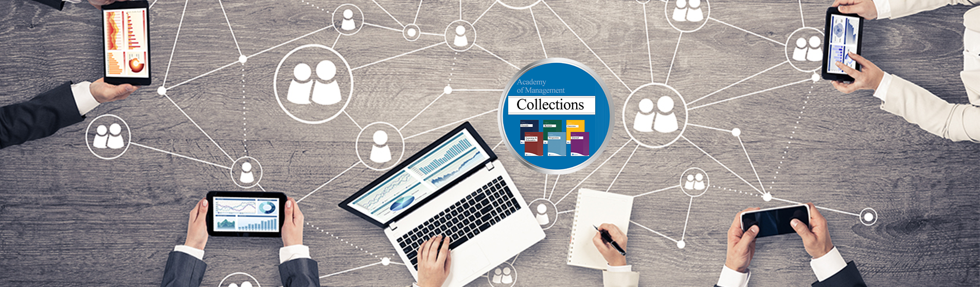 Imageofdeskwithcomputersandinterconnecteddata