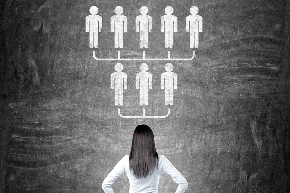 Woman looks at simplified org chart