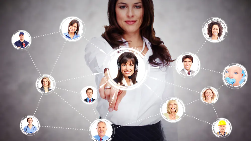 Woman looks at visual representation of her work and social network