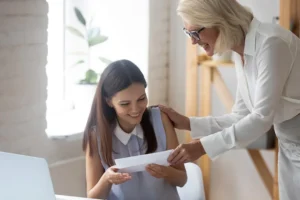 Boss congratulates worker