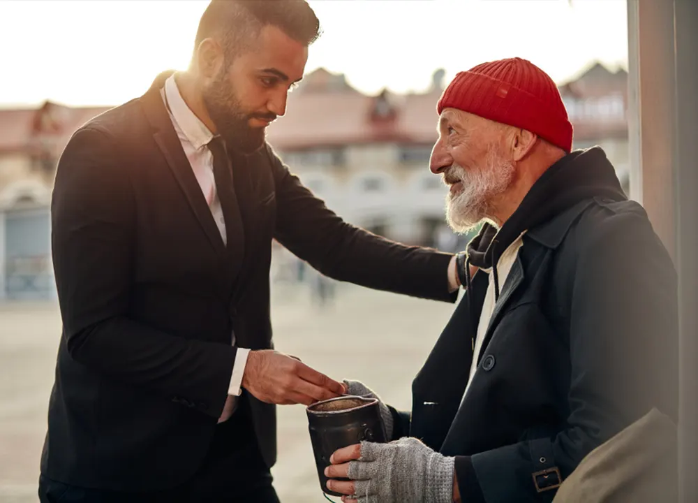 Homeless man handed money