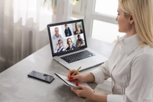 Woman attends an online meeting