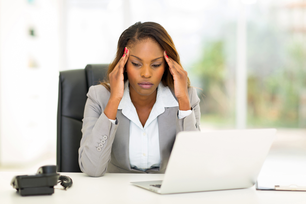 A woman stressed at work