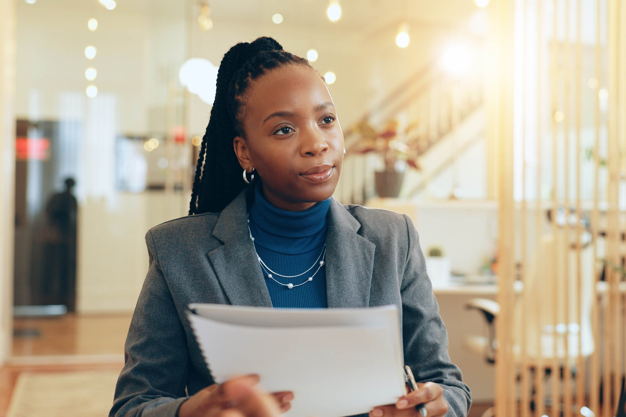 African businesswoman, paperwork and meeting for interview, assessment and discussion as employee. Female person, document and contract for onboarding, recruitment and human resources as hiring team.