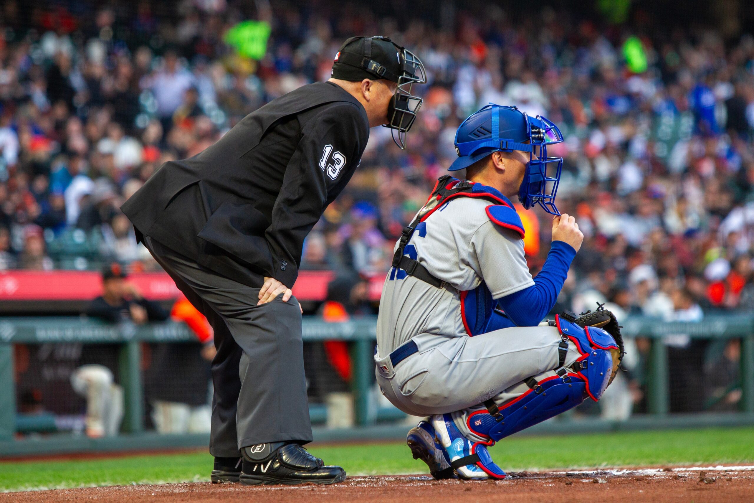 Los Angeles Dodgers catcher Will Smith and home plate umpire Todd Tichenor during a game against the San Francisco Giants at Oracle Park.