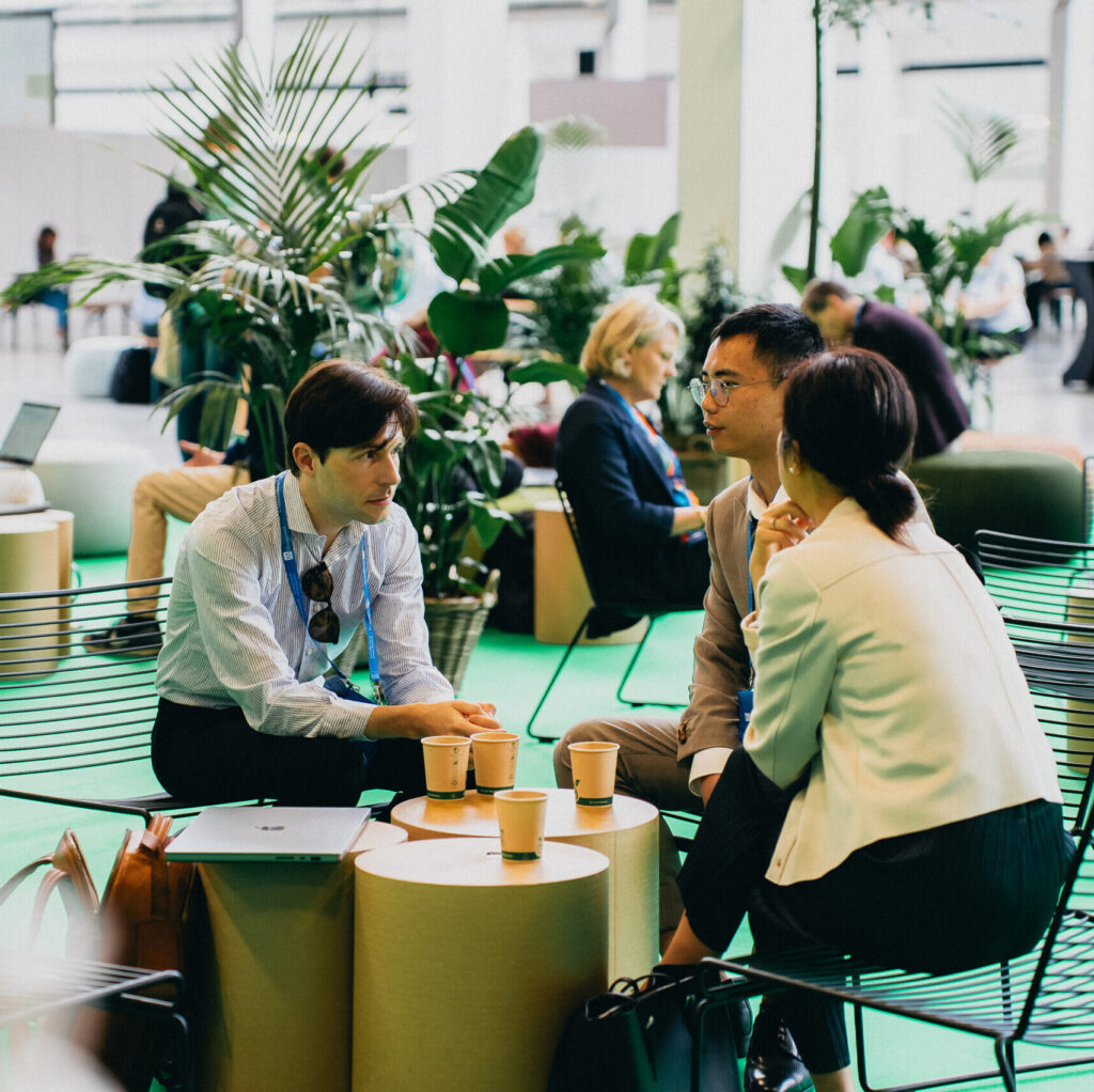 Image of members networking at a table